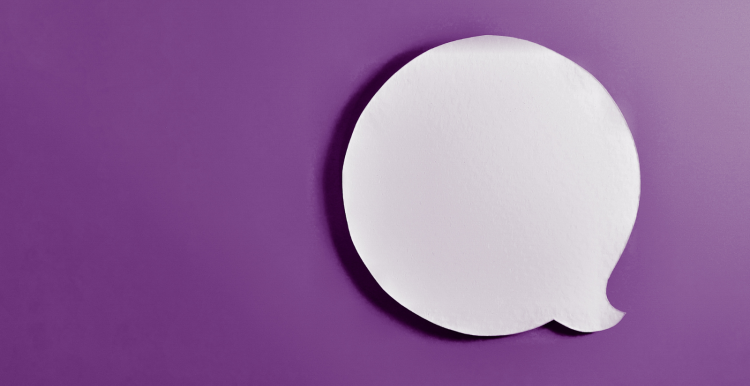 white speech bubble on purple background