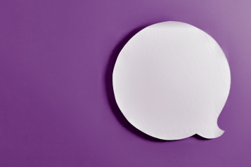 white speech bubble on purple background